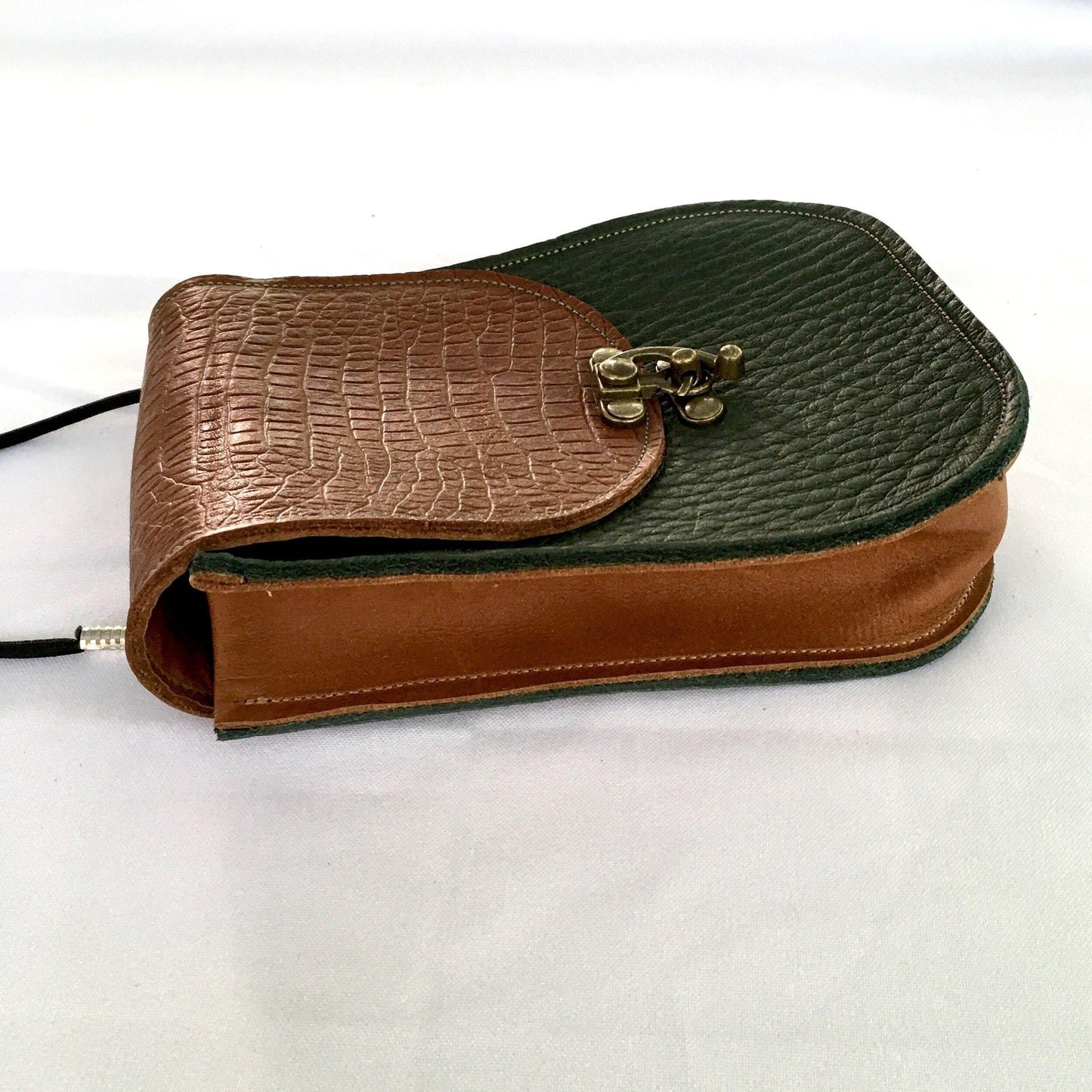 Essentials convertible bag Green with Brown flap and side gusset