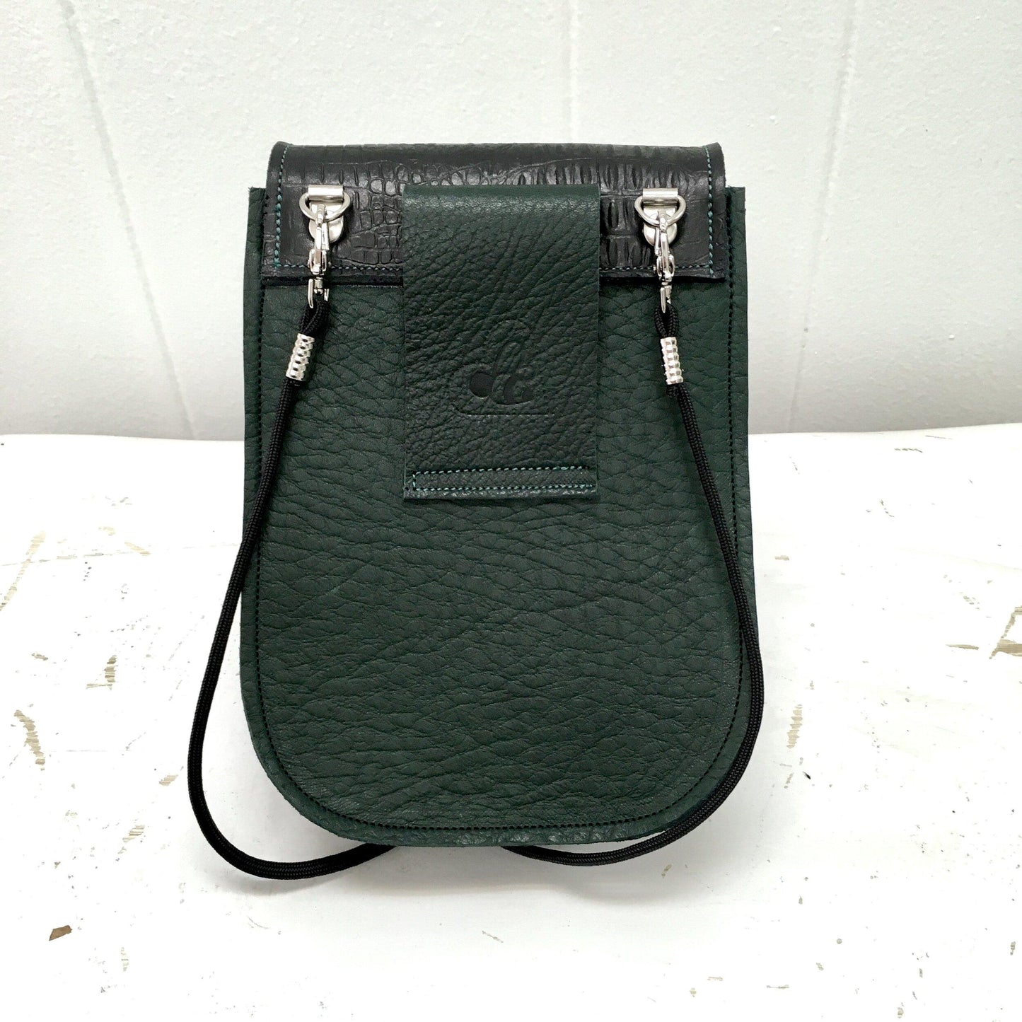 Essentials convertible bag Green with Black flap and side gusset